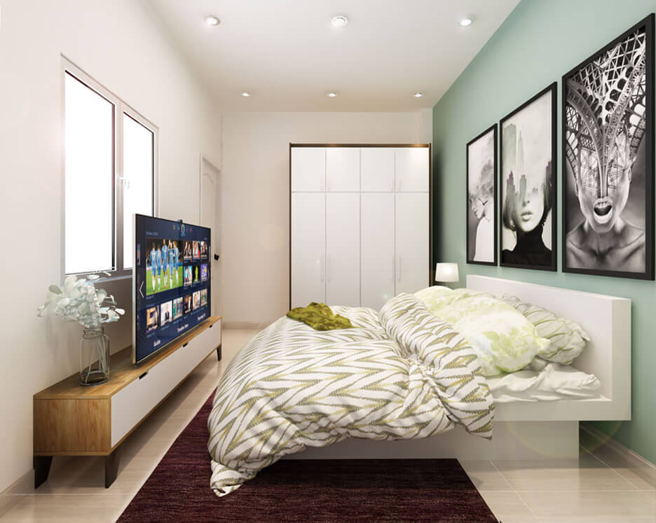 Phòng ngủ bé trai với mãng tường màu xanh làm điểm nhấn